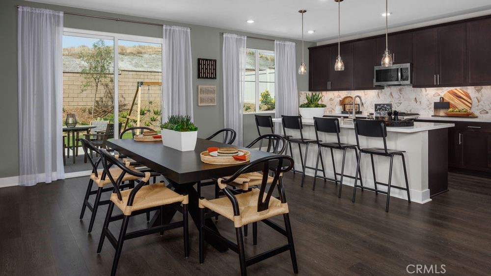 9552 Glenmore Frst Drive Riverside, CA 92508 - Photo 9 of 17 a view of a dining room with furniture window and outside view