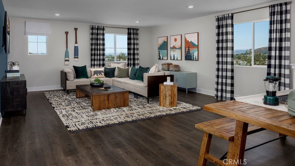 9552 Glenmore Frst Drive Riverside, CA 92508 - Photo 10 of 17 a living room with furniture and wooden floor