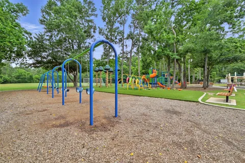 a view of a park with swings