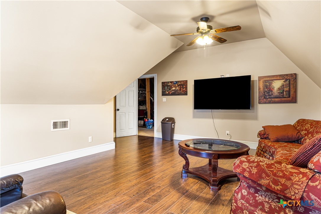 790 Spanish Grant Road Goliad, TX 77963 - Photo 31 of 41 a living room with furniture and a flat screen tv