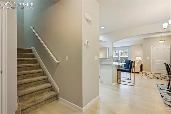 a view of kitchen with livingroom and furniture