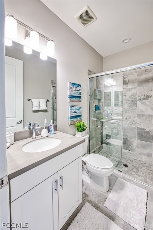 2925 Willow Ridge Court Fort Myers, FL 33905 - Photo 21 of 50 a bathroom with a granite countertop sink mirror vanity and toilet
