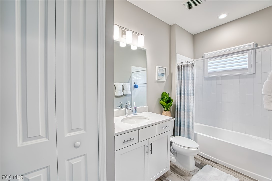 2925 Willow Ridge Court Fort Myers, FL 33905 - Photo 28 of 50 a bathroom with a sink a toilet and shower