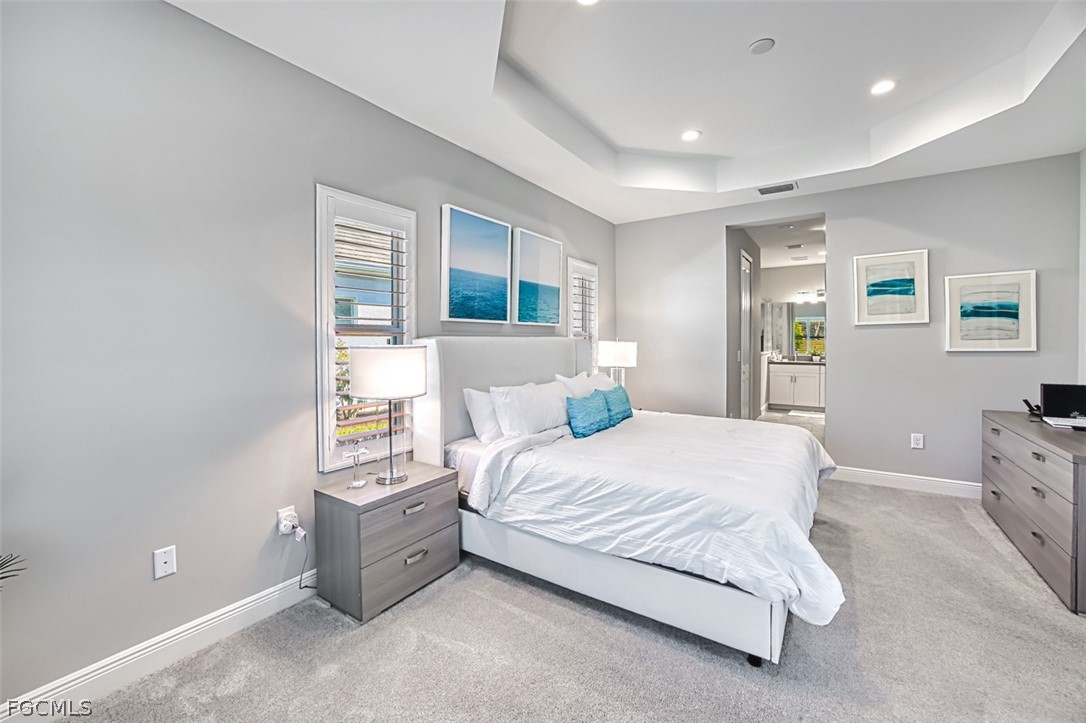 2925 Willow Ridge Court Fort Myers, FL 33905 - Photo 41 of 50 a bedroom with a bed and window