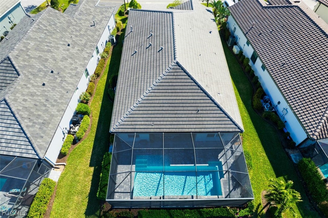 2925 Willow Ridge Court Fort Myers, FL 33905 - Photo 6 of 50 a front view of a house with a garden