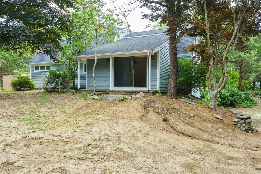 75 John Thomas Road Eastham, MA 02642 - Photo 17 of 23 front view of a house with a yard