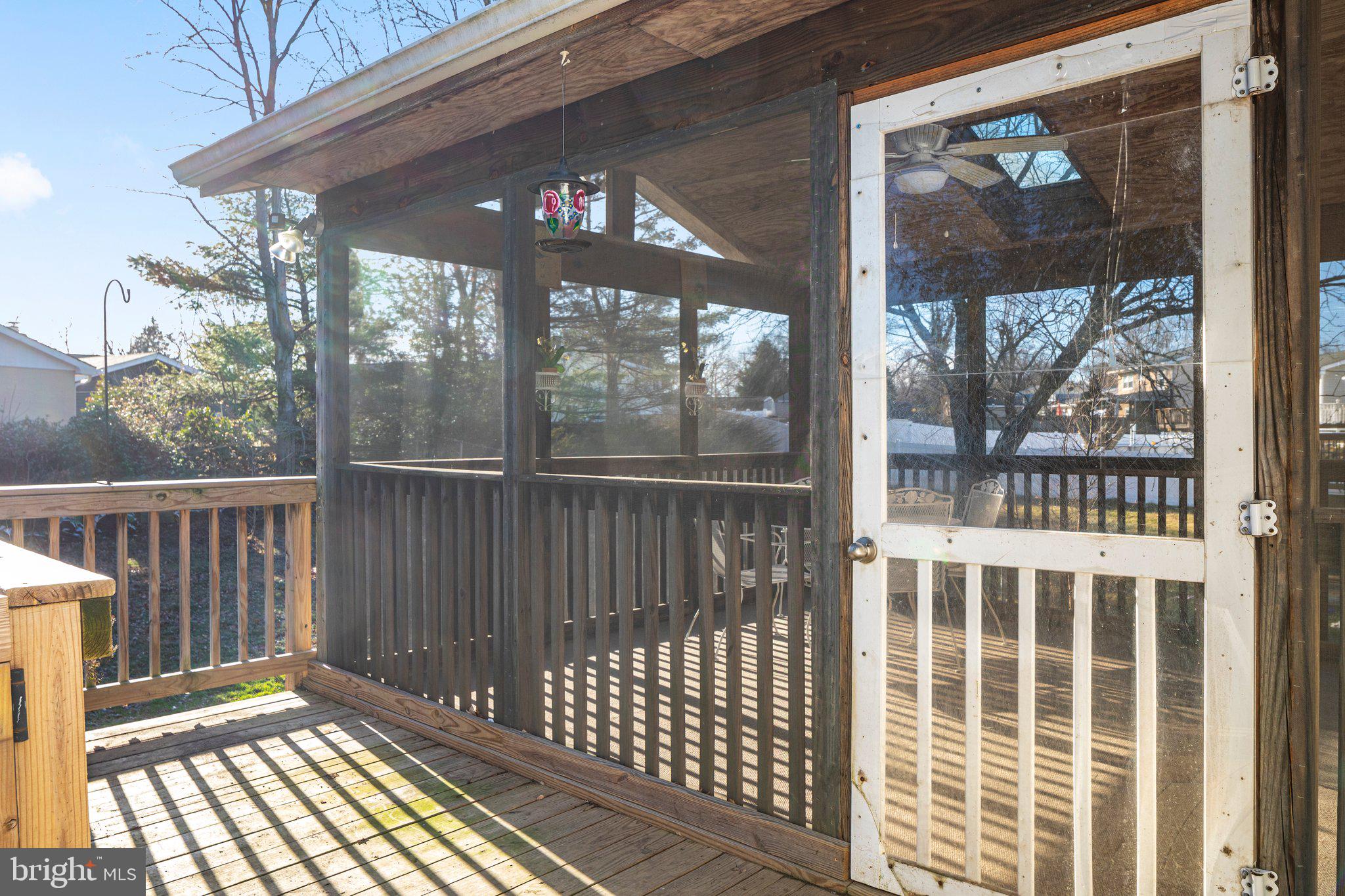 112 North Harrison Road Sterling, VA 20164 - Photo 18 of 26 Additional deck space off the screened porch