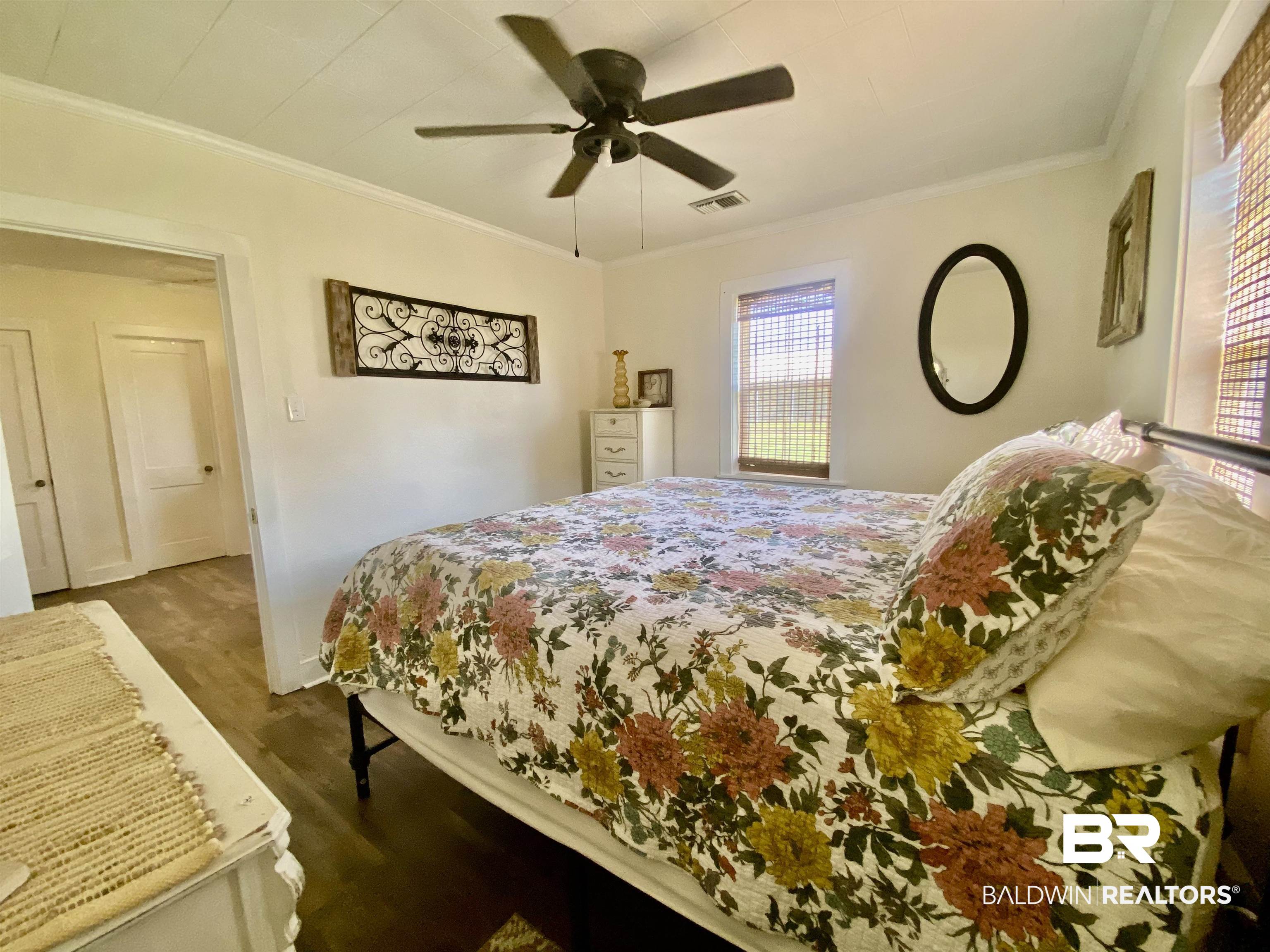 531 Highway 136 Monroeville, AL 36460 - Photo 35 of 48 Bedroom featuring ornamental molding, ceiling fan, and hardwood / wood-style floors