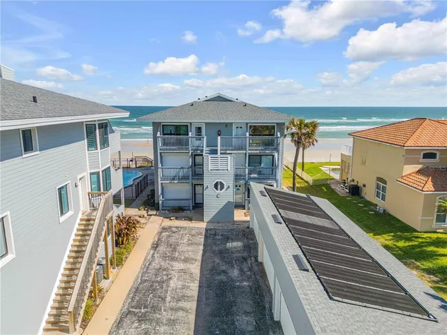 a view of a swimming pool with an ocean view