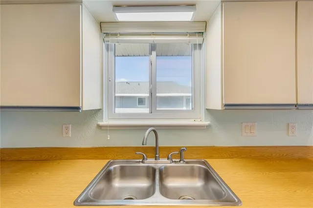 a bathroom with a shower and a toilet