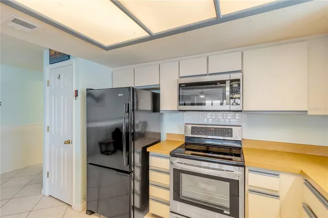 a view of storage and utility room with washer and dryer