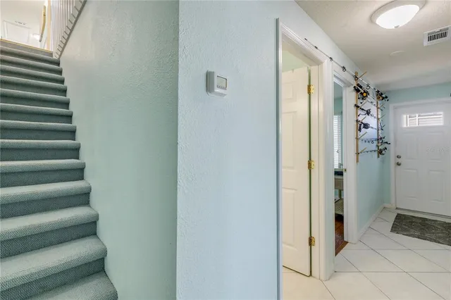 a view of a swimming pool with a lounge chairs