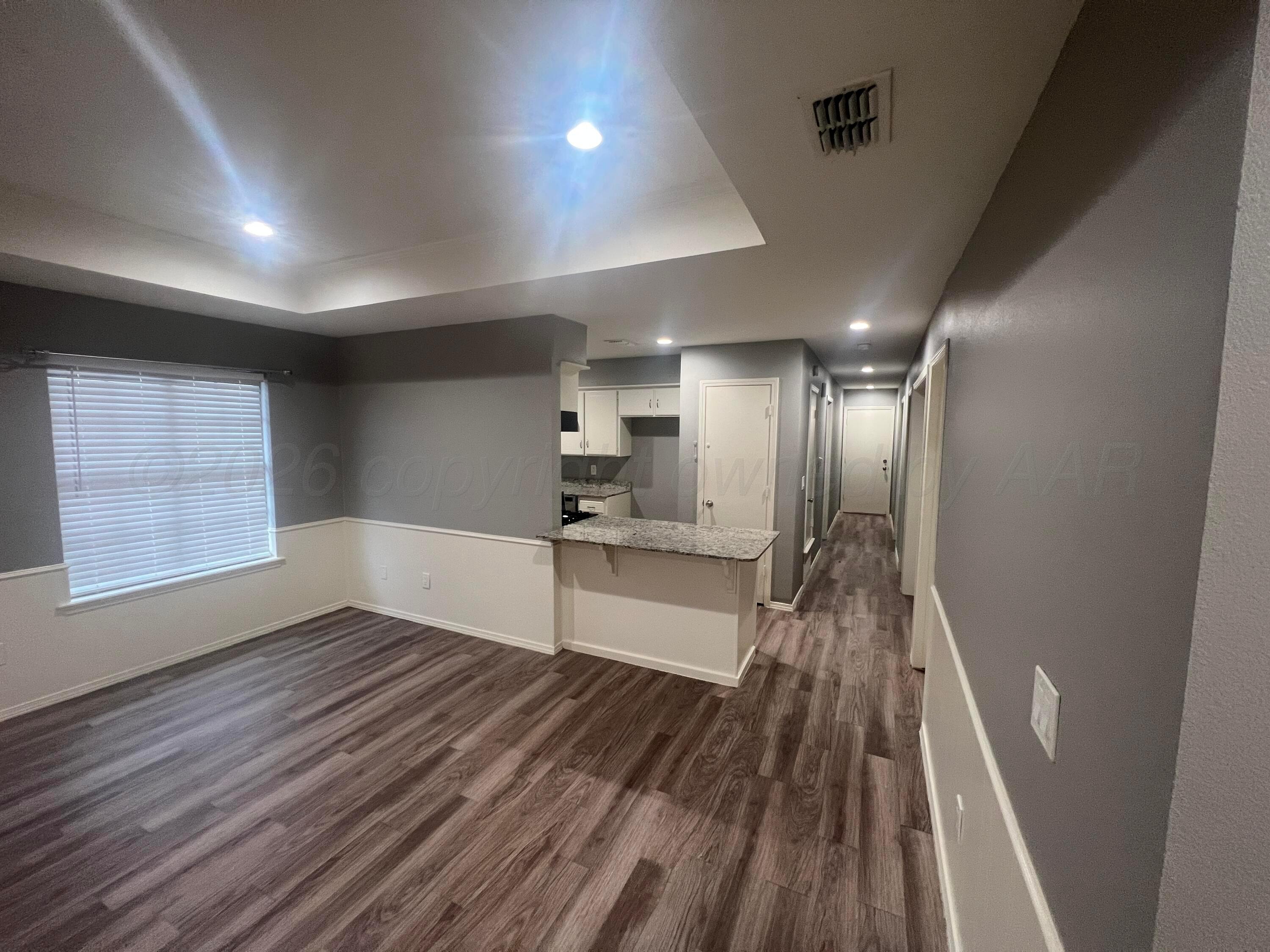 1008 Sugarloaf Drive Amarillo, TX 79110 - Photo 6 of 25 living to kitchen