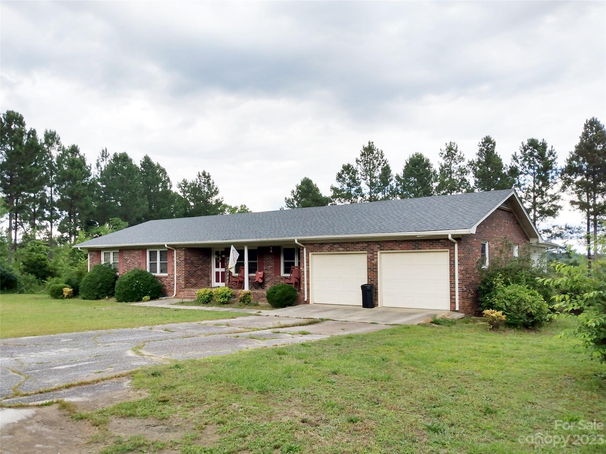 336 Mt Tabor Church Road Union, SC 29379 - Photo 1 of 37 a front view of a house with garden