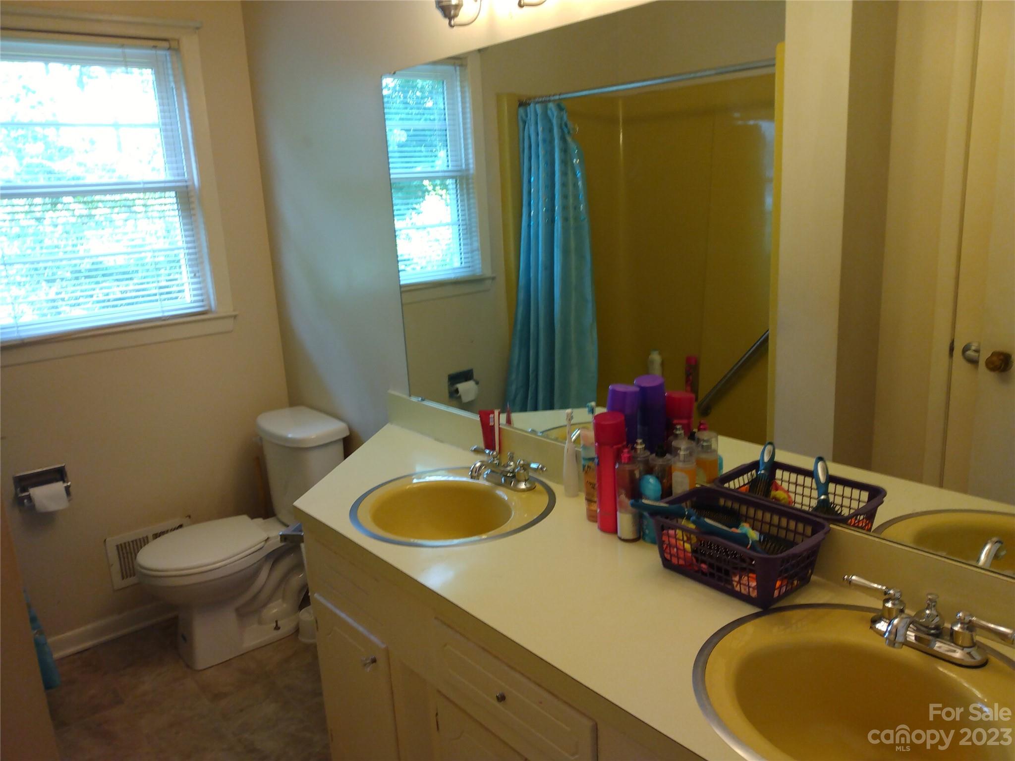336 Mt Tabor Church Road Union, SC 29379 - Photo 26 of 37 a bathroom with a sink and a mirror