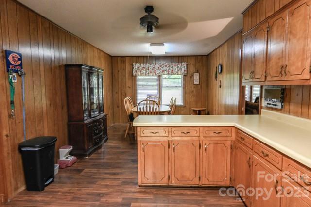 336 Mt Tabor Church Road Union, SC 29379 - Photo 6 of 37 a kitchen with stainless steel appliances granite countertop a refrigerator a sink dishwasher a stove and a dining table with wooden floor