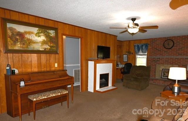 336 Mt Tabor Church Road Union, SC 29379 - Photo 10 of 37 a living room with furniture a fireplace and a flat screen tv