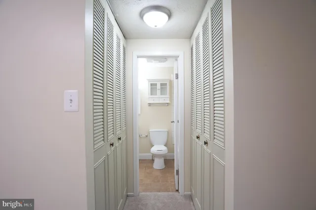 a view of bathroom with a toilet