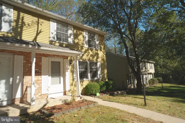 a front view of a building with street view