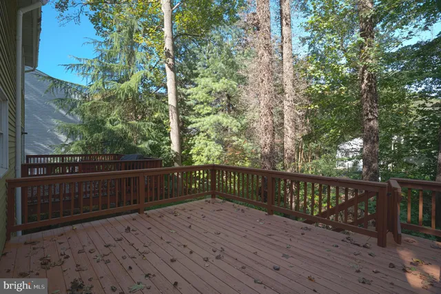 a balcony with wooden floor