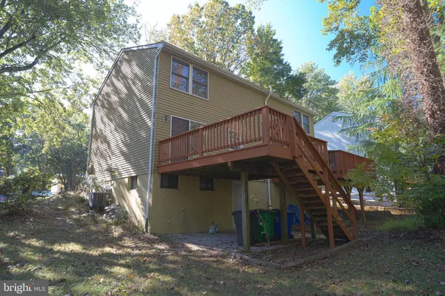 a view of a house with a tree