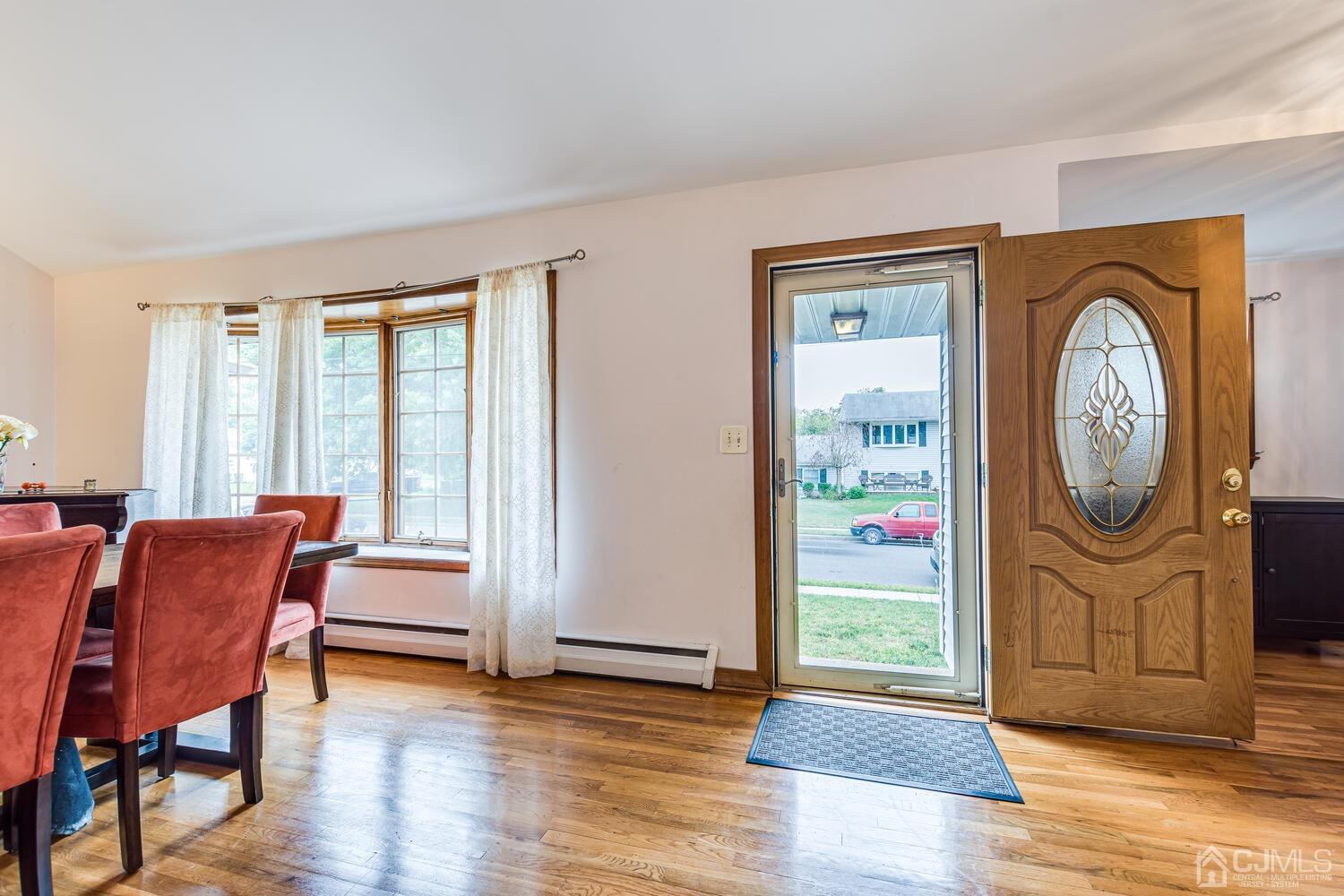 41 Partch Place Edison, NJ 08817 - Photo 3 of 28 a view of a livingroom with furniture and wooden floor