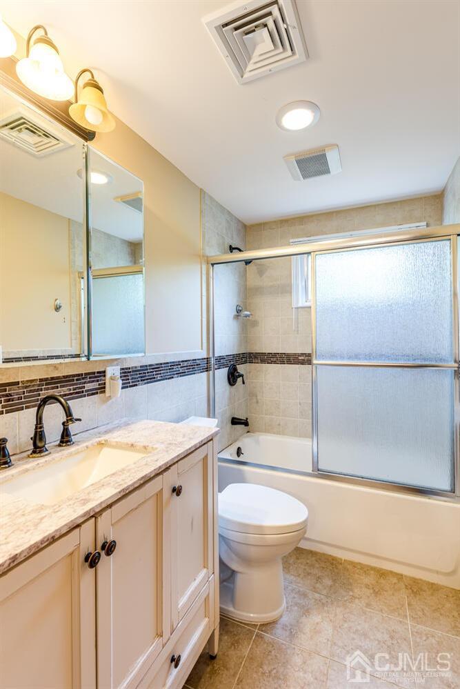 41 Partch Place Edison, NJ 08817 - Photo 22 of 28 a bathroom with a sink a toilet and shower