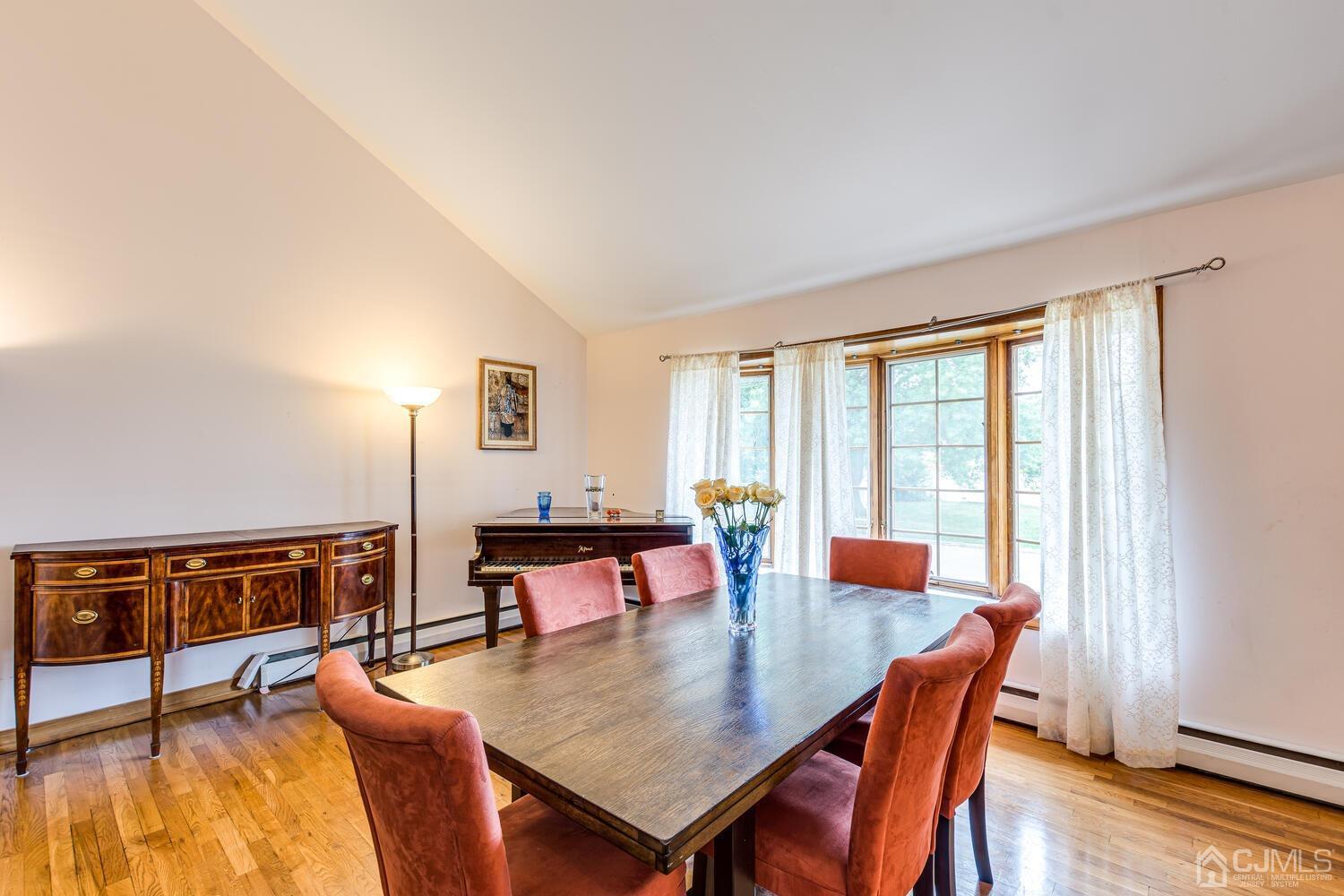 41 Partch Place Edison, NJ 08817 - Photo 6 of 28 a dining room with furniture and wooden floor