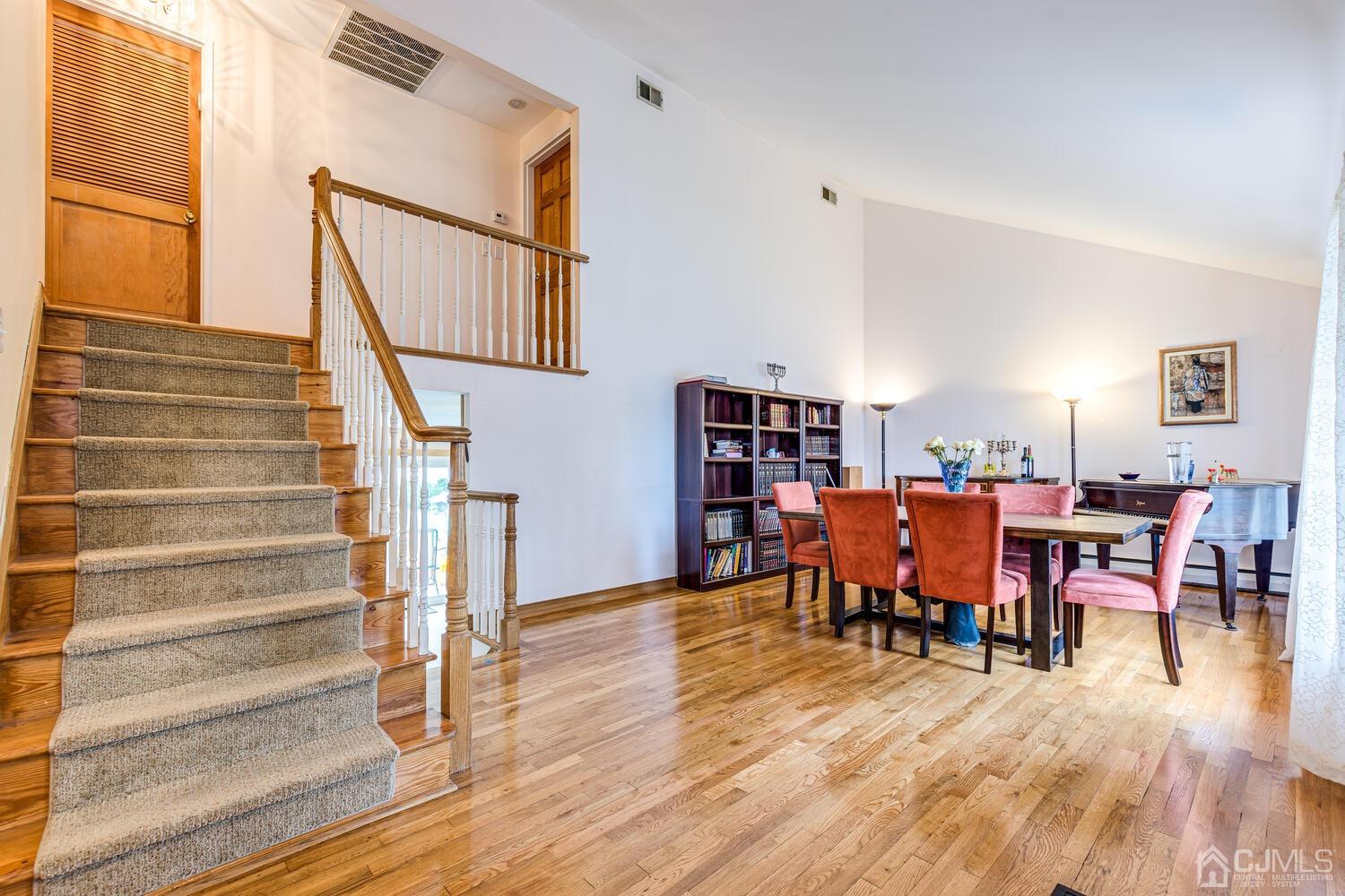 41 Partch Place Edison, NJ 08817 - Photo 7 of 28 a view of a livingroom with furniture and wooden floor