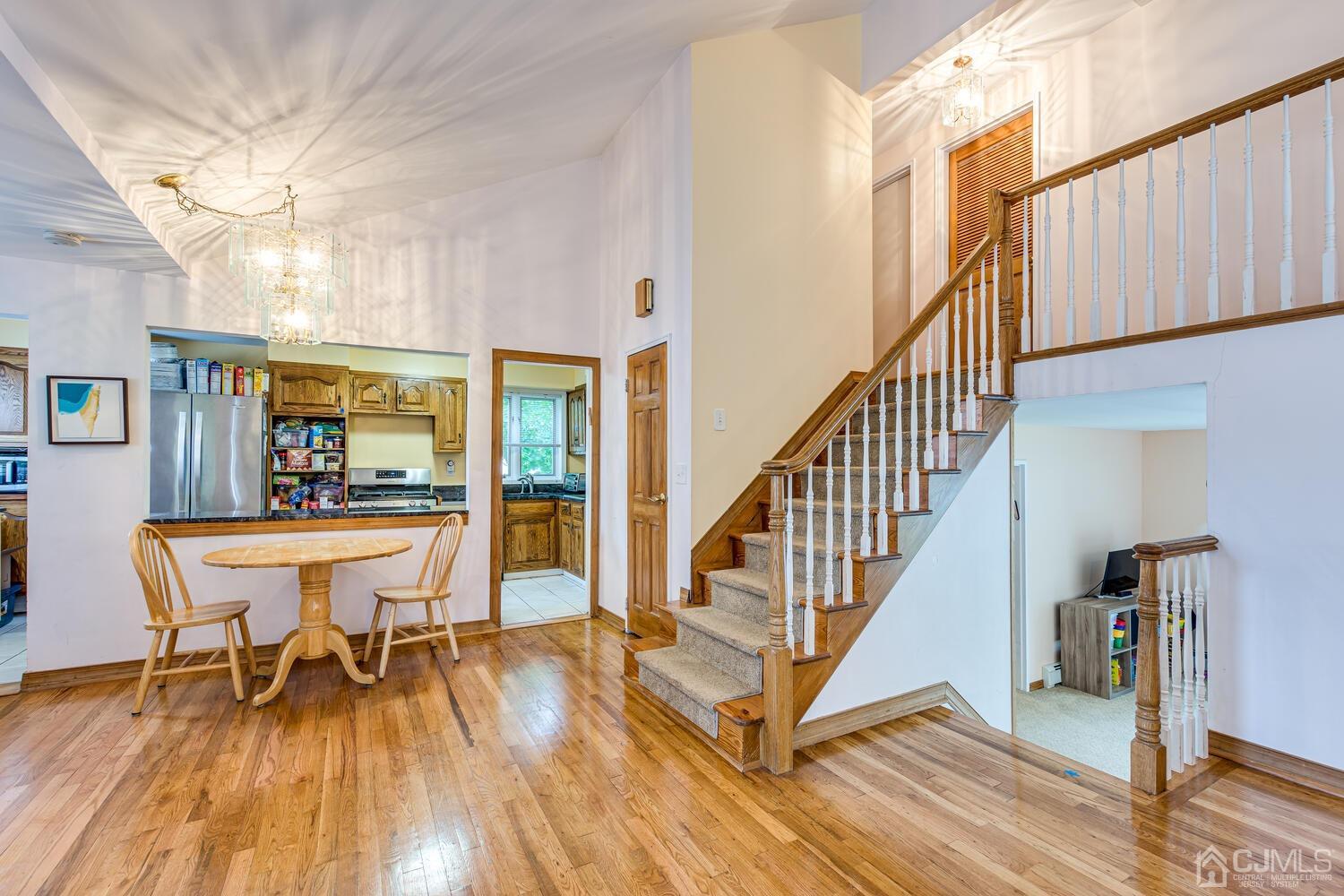41 Partch Place Edison, NJ 08817 - Photo 8 of 28 a view of a room with wooden floor and furniture