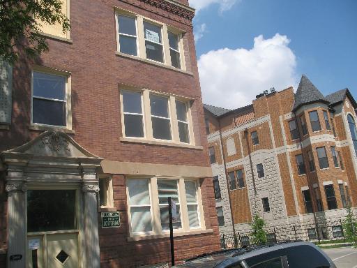 5000 South Champlain Avenue, Unit 3 Chicago, IL 60615 - Photo 1 of 1 a front view of a multi story building