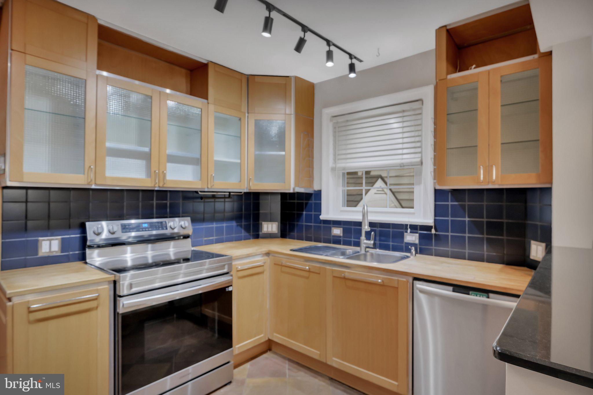 1706 North Glebe Road Arlington, VA 22207 - Photo 13 of 36 Modern kitchen with sleek finishes.