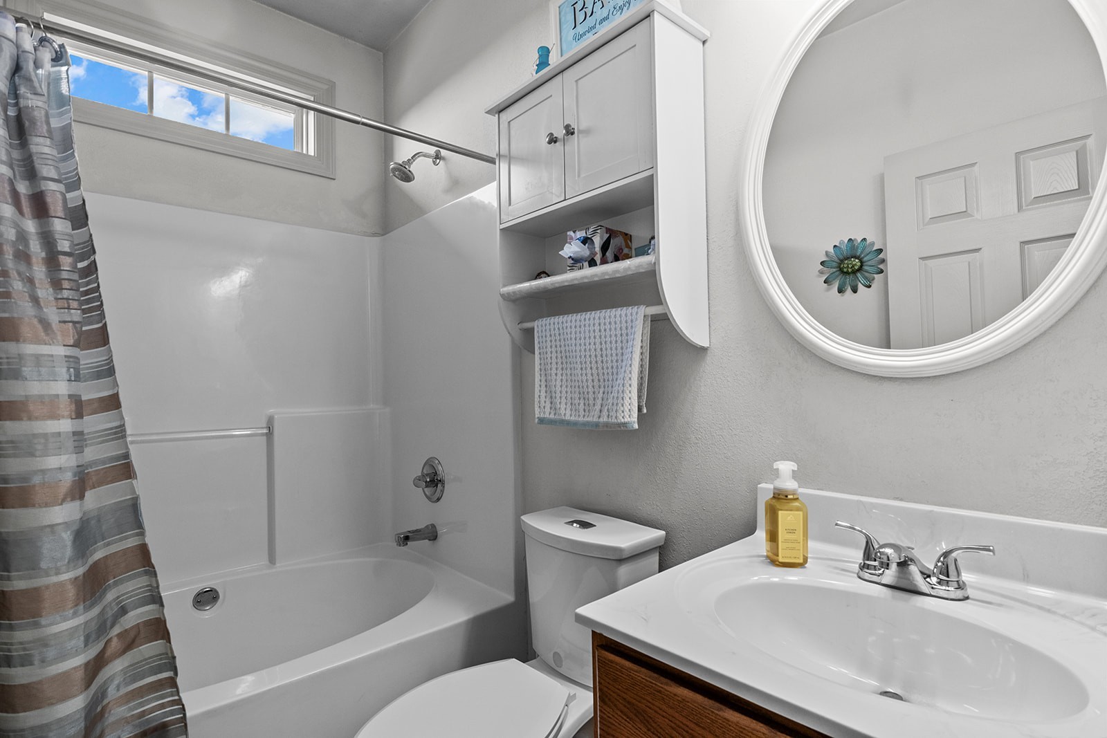 341 Murrell Road Dickson, TN 37055 - Photo 7 of 14 a bathroom with a sink a mirror and a toilet