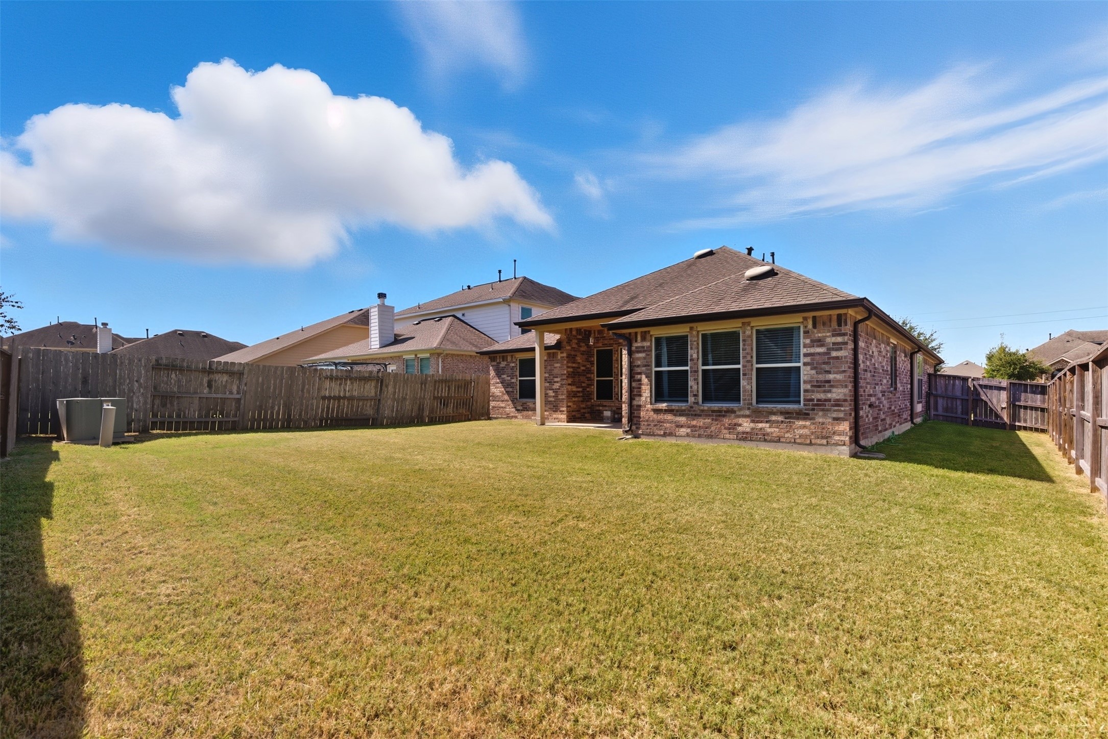 4507 Barnstone Ridge Lane Rosharon, TX 77583 - Photo 21 of 23 a front view of a house with a yard