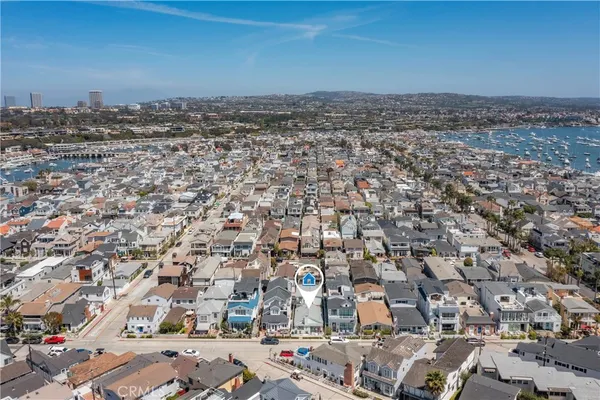 an aerial view of a residential building with outdoor space