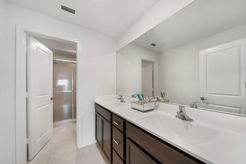 2004 Sugar Maple Drive Riviera Beach, FL 33410 - Photo 9 of 37 Primary Bathroom