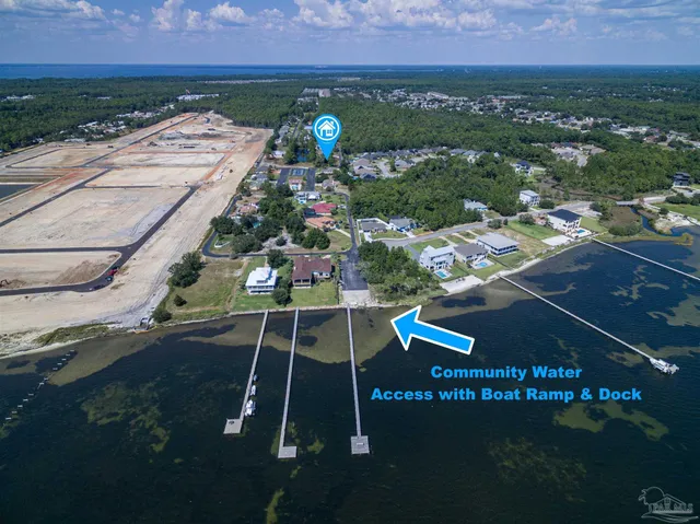 a swimming pool with outdoor seating and yard