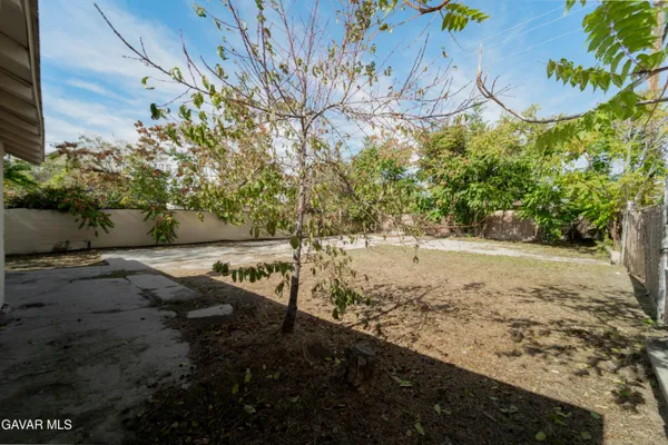 a view of backyard with green space