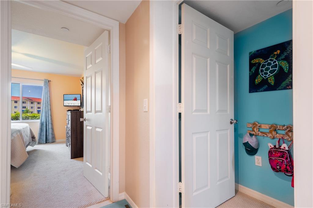 8264 Key Royal Circle, Unit 813 Naples, FL 34119 - Photo 11 of 21 a view of an entryway with wooden floor