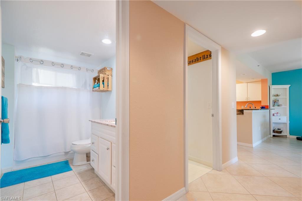 8264 Key Royal Circle, Unit 813 Naples, FL 34119 - Photo 15 of 21 a bathroom with a sink and toilet