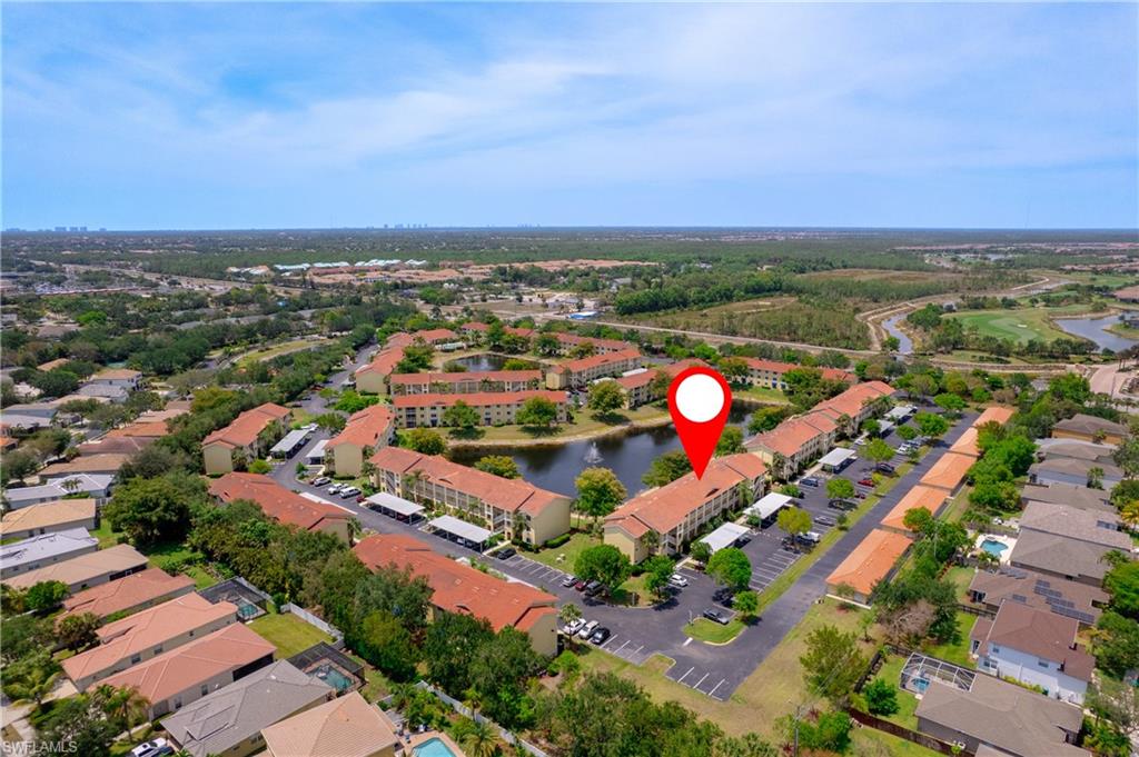 8264 Key Royal Circle, Unit 813 Naples, FL 34119 - Photo 4 of 21 an aerial view of a city