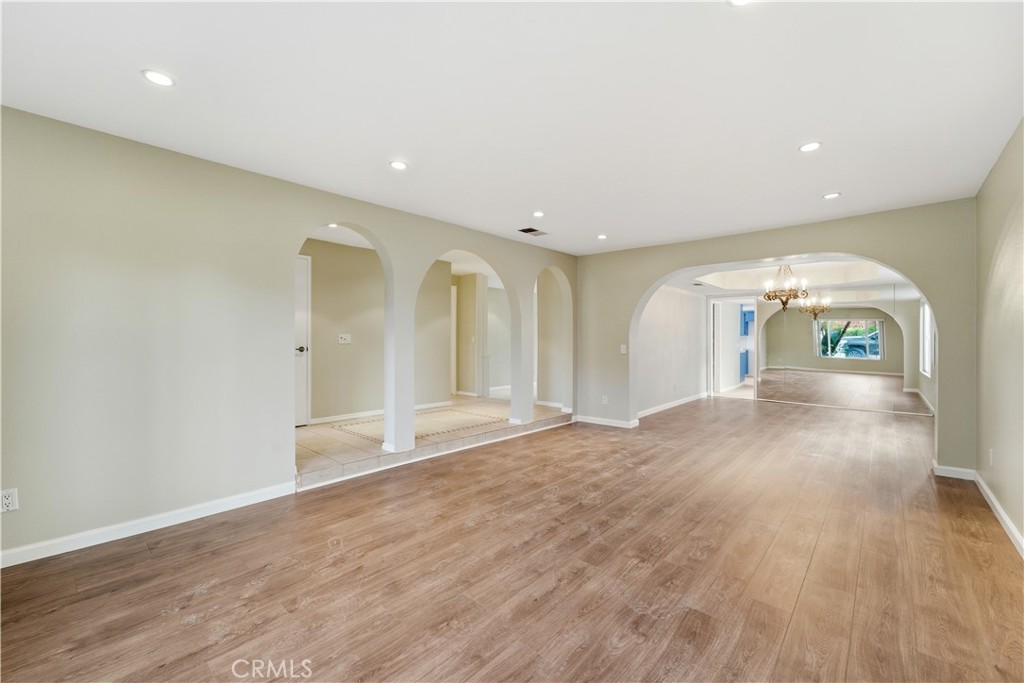 16650 Rinaldi Street Granada Hills, CA 91344 - Photo 1 of 35 a view of empty room with wooden floor
