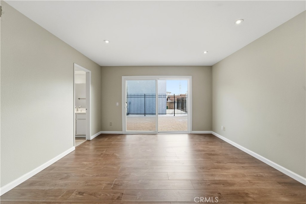 16650 Rinaldi Street Granada Hills, CA 91344 - Photo 25 of 35 a view of empty room with wooden floor