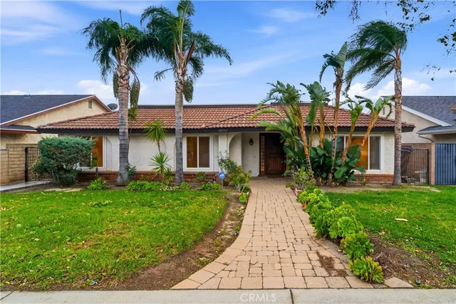 a view of garage and yard