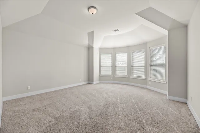 a bathroom with a granite countertop sink mirror and double