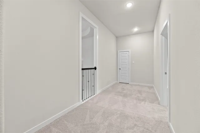 a bathroom with a granite countertop sink and a mirror a bathtub