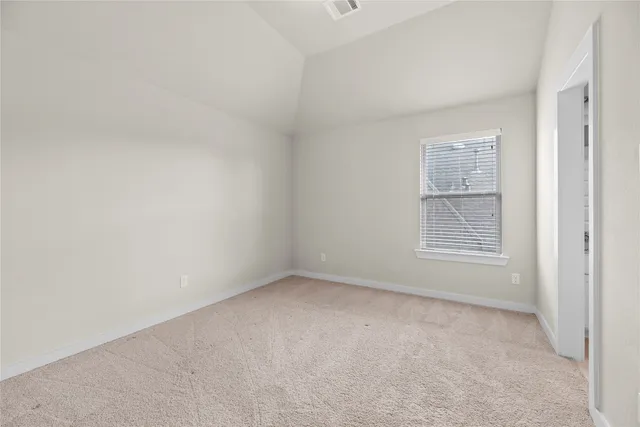 a workspace with furniture and a window