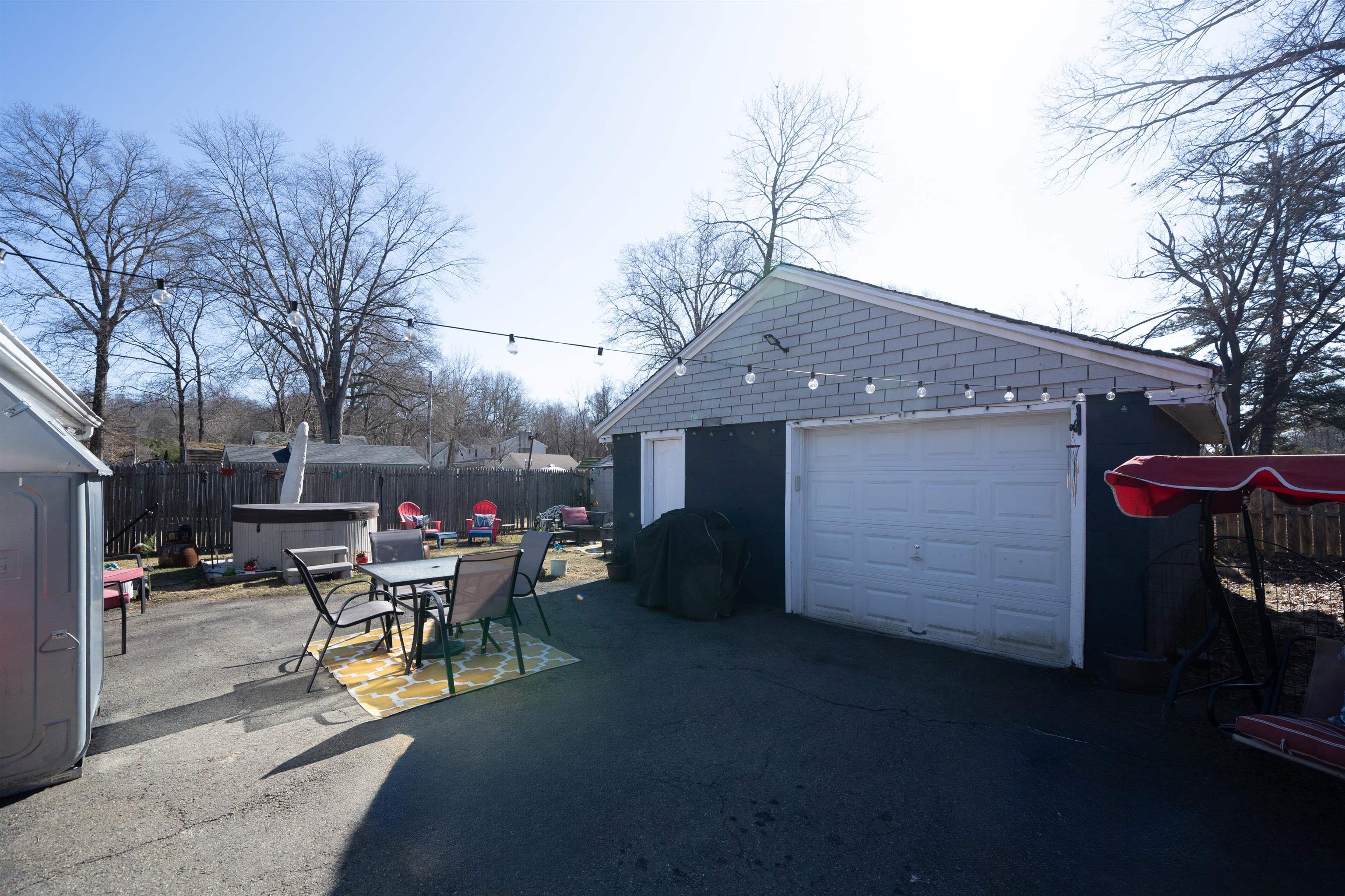 33 South Road Wayne, NJ 07470 - Photo 18 of 22 a view of a patio with a table and chairs