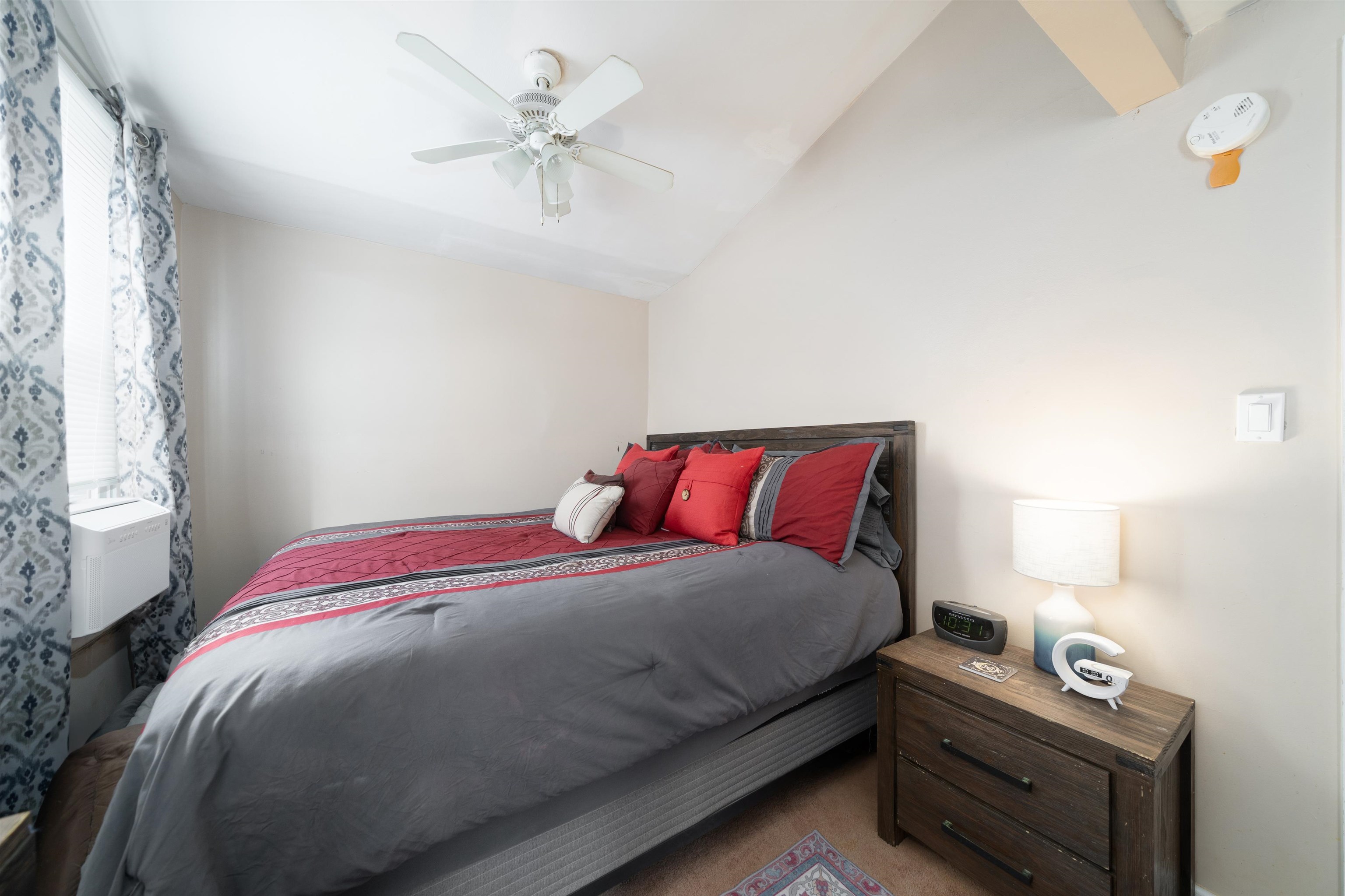 33 South Road Wayne, NJ 07470 - Photo 6 of 22 a bedroom with a bed and a ceiling fan