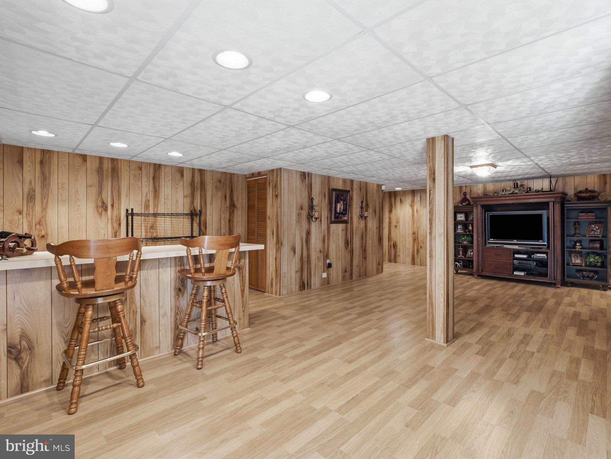 2606 Ridge Road South Martinsburg, WV 25403 - Photo 37 of 57 Cozy basement retreat with warm wood accents.